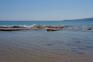 Waves on the stone coast of Crete