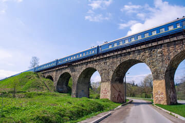 Fototapeta na wymiar Railway Bridge-Viaduct in Carpathian village Vorokhta.