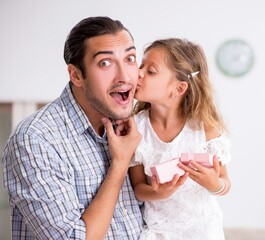 Father celebrating birthday with his daughter
