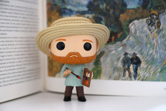 
Vincent van Gogh. Funko Pop. Dutch impressionist painter. Collectible children's toy. Book with paintings of the plastic artist. Painter who cut off his ear. Postimpressionism. 