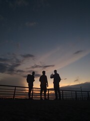 Fototapeta na wymiar family at sunset
