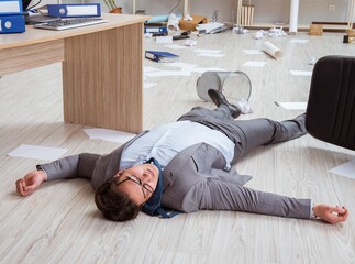 Businessman dead on the office floor