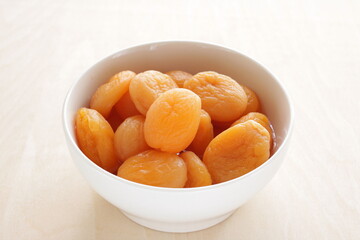 Dried fruit, apricot in bowl for healthy snack food image