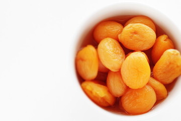 Dried fruit, apricot in bowl for healthy snack food image