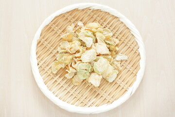 Japanese healthy food ingredient, dried radish slices on bamboo basket