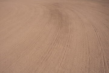 raked clay area of baseball softball diamond