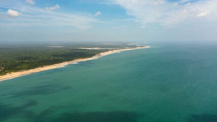 Naklejka na ściany i meble Tropical landscape with beautiful sandy beach and blue sea. Sri Lanka.