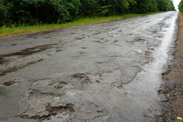 Very bad road surface. Holes on the road.