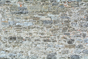 Photo of a stone wall. Abstract background.