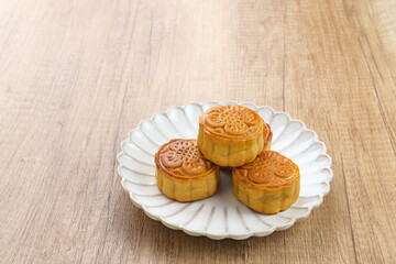 Obraz na płótnie Canvas Moon Cake, traditional Chinese snack popular during the mid-autumn festival. 
