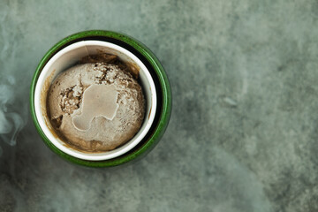 Sweet ice cream in paler bowl