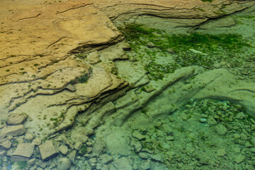 The turquoise water of the lake is crystal clear