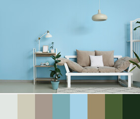 Beautiful sofa and shelf unit near light blue wall. Different color patterns