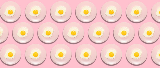 Many plates with fried eggs on pink background. Pattern for design