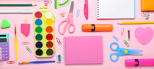 Different school stationery on pink background, top view