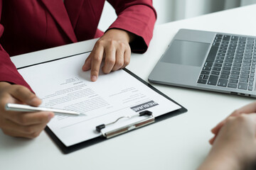 Business people hold a resume and talk to job applicants for job interviews about careers and Their personal history in the company. Recruitment concepts