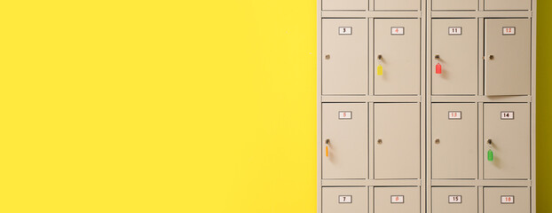 Modern locker on yellow background with space for text