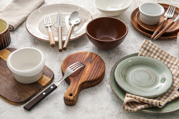 Clean tableware on light background