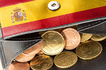Spanische Flagge, Geldbörse und Euro Münzen