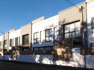 terrace houses, new build, modern and contemporary architectural style and design, close up view of exterior at street level