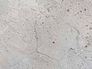 Unfinished cement wall texture background.  Rough texture of concrete wall. 