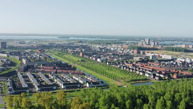 Almere Poort district in a modern green growing city in The Netherlands, province Flevoland, suburb of Amsterdam. Aerial drone shot.