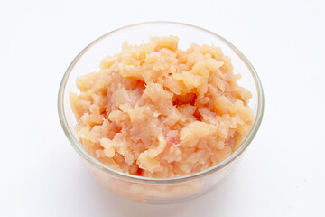 Minced meat of chicken fillet in glass bowl