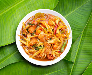 Spicy papaya salad with pickled shells