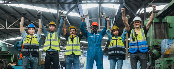 Teamwork of engineer, successful of happy engineering people working in factory industry show hand...