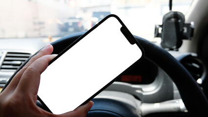 Women hand using smartphone in car. Smartphone in a car use for Navigate. Blank empty screen
