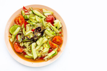 Spicy cucumber salad in plate. Copy space