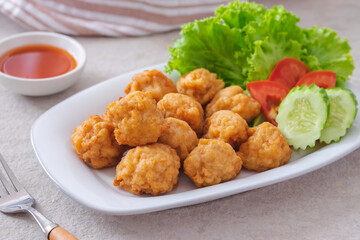 Deep fried shrimp ball and vegetable on plate