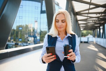 Portrait of business woman smiling outdoor