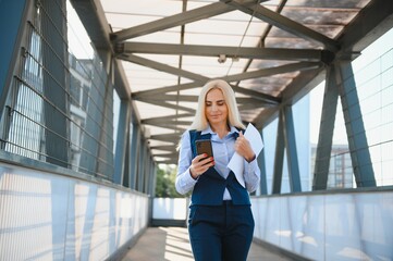 Fototapeta premium Portrait of business woman smiling outdoor