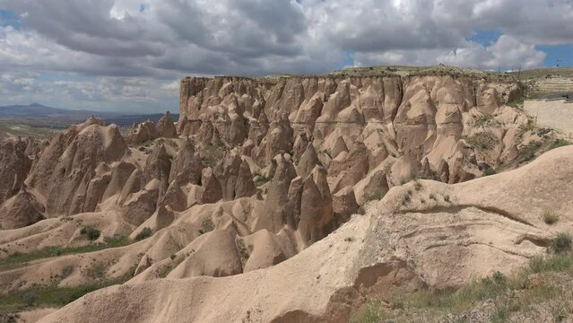 Avanos, Turkey - 26th of June 2022: 4K Tour to Cappadocia - Top view on the Devrent valley and its lunar landscape
