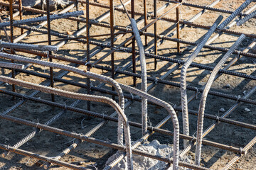 Reinforcement prepared for pouring a reinforced concrete foundation or grillage. Preparation of the base for pouring concrete. Close-up.