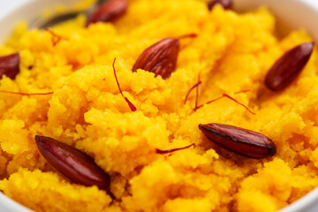 Badam Halwa or sheera also known as Almond Halwa is a traditional Indian sweet dish prepared...