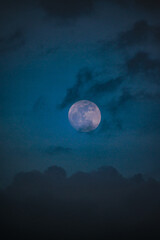 Fototapeta na wymiar full moon over sky