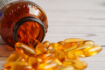 Bangkok, Thailand - April 27, 2022 Fish oil or Cod liver oil gel in capsules with omega 3 vitamins, supplementary healthy food