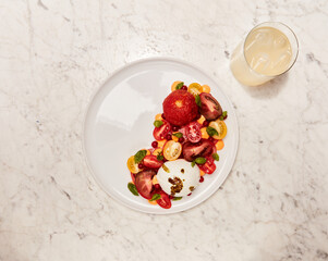summer salad tomato mozzarella burrata with drink
