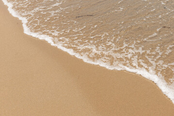 砂浜に寄せる波