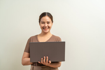 Asian women holding laptop computer. Work from home business concept.