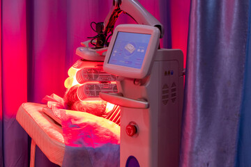 The patient is undergoing infrared light therapy for the nervous system