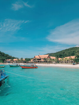 Boats, turquoise water and white sand beach, Redang Island, Malaysia