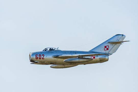 Leszno, Poland - June, 17, 2022: Antidotum Airshow Leszno, Lim-2 (Mig-15), fighter plane. The pilot of the plane performs acrobatics in the air, demonstrating his skills and capabilities of the plane.