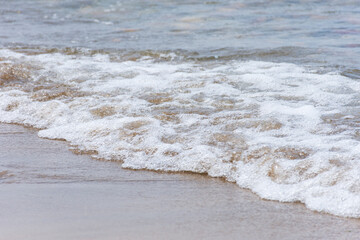 View of tiny Mediterranean sea waves. Summer vacation concept.