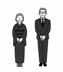 喪服のシニア男女