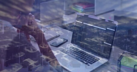 Animation of data processing over african american businesswoman using laptop