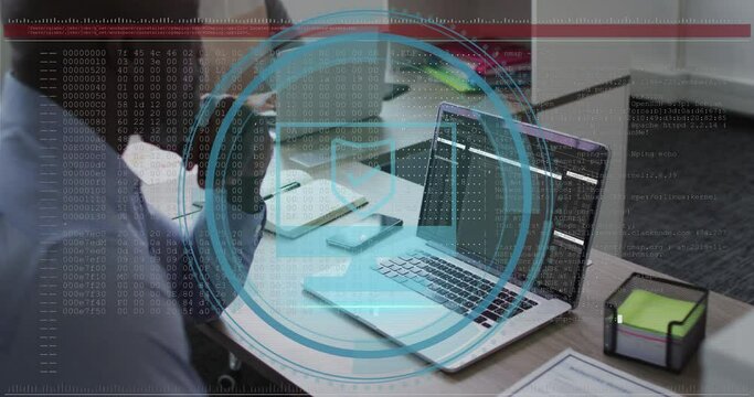 Animation of data processing over african american businessman using laptop - Powered by Adobe