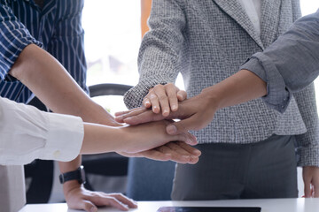 Black people with hands joined. Group of people stacking hands together